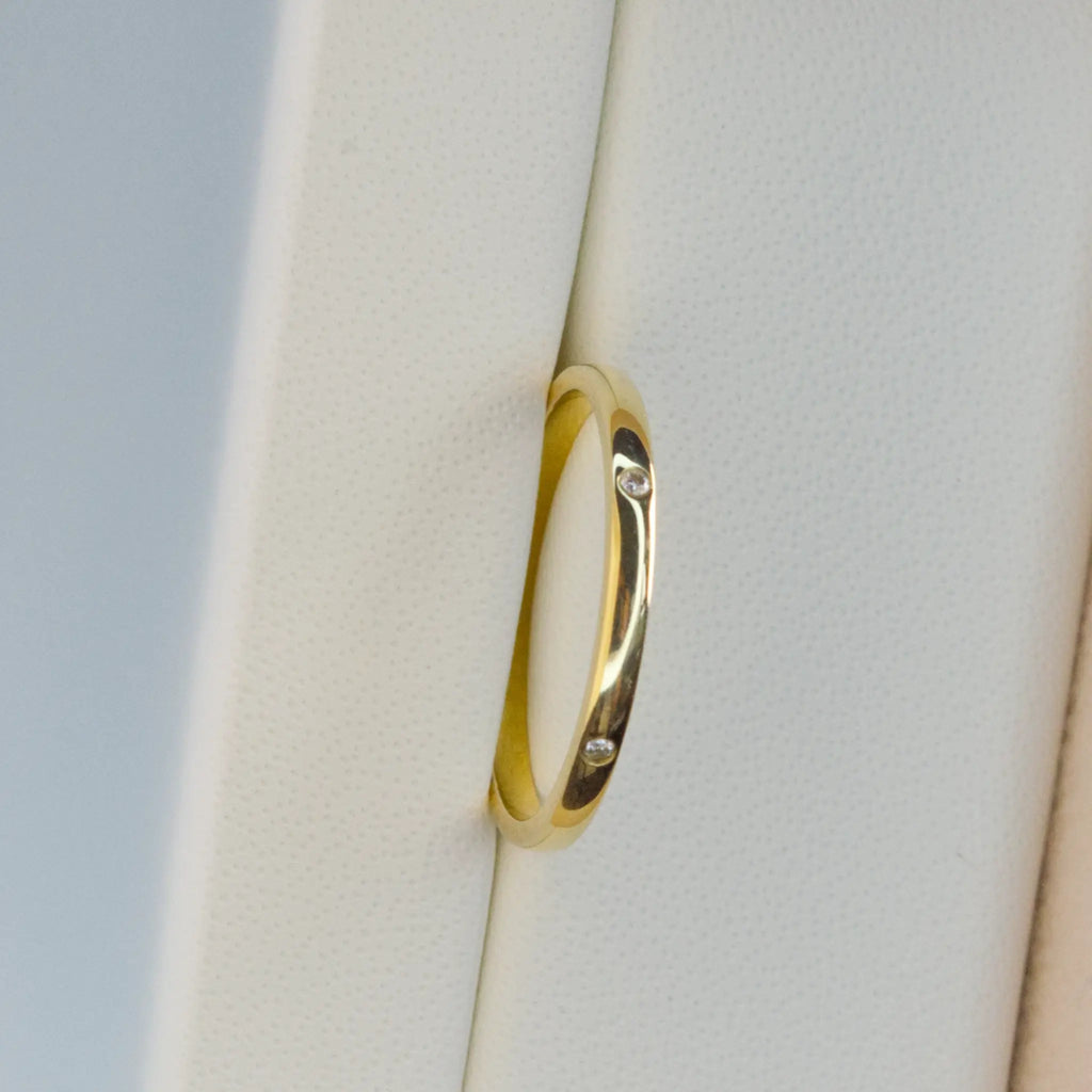 Dainty Spaced Diamond Band