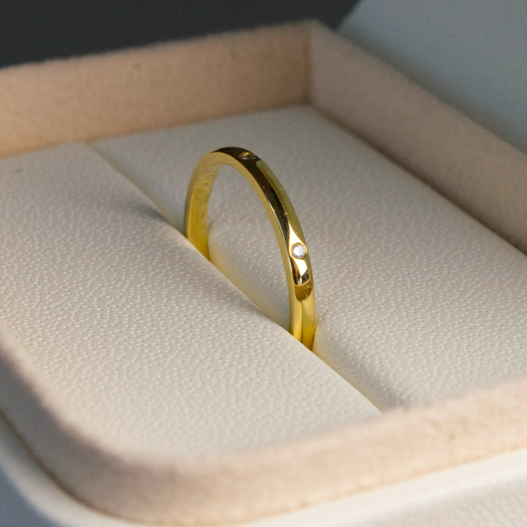 Dainty Spaced Diamond Band