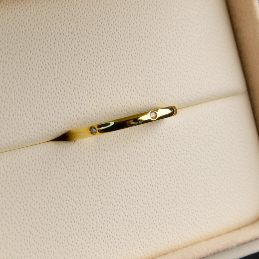 Dainty Spaced Diamond Band