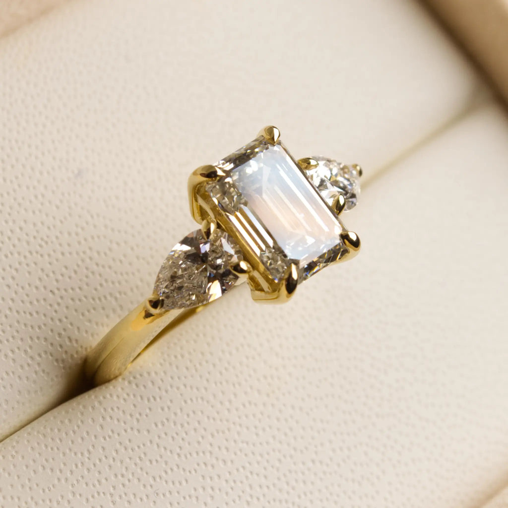 3ct Emerald cut diamond ring with Pear Diamonds
