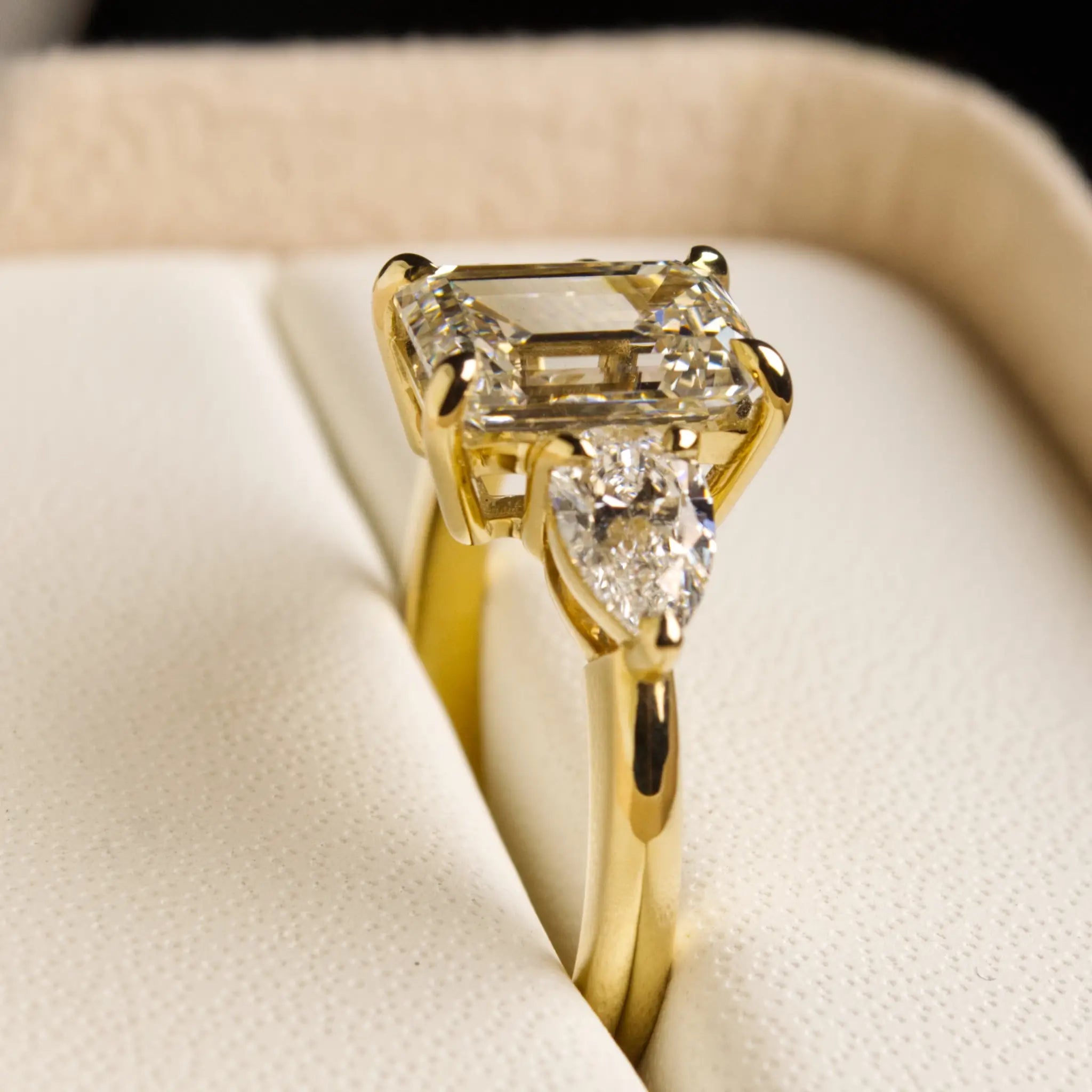 3ct Emerald cut diamond ring with Pear Diamonds