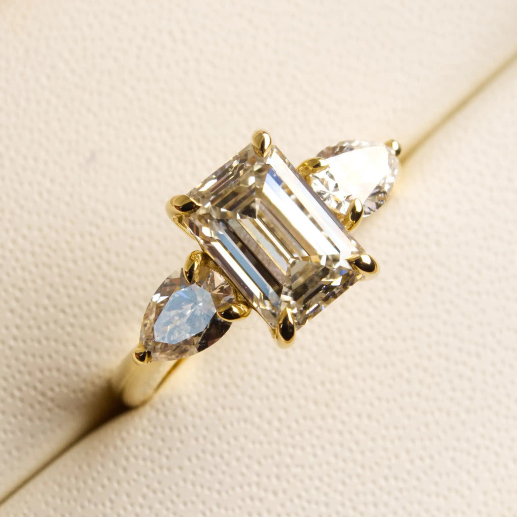 3ct Emerald cut diamond ring with Pear Diamonds