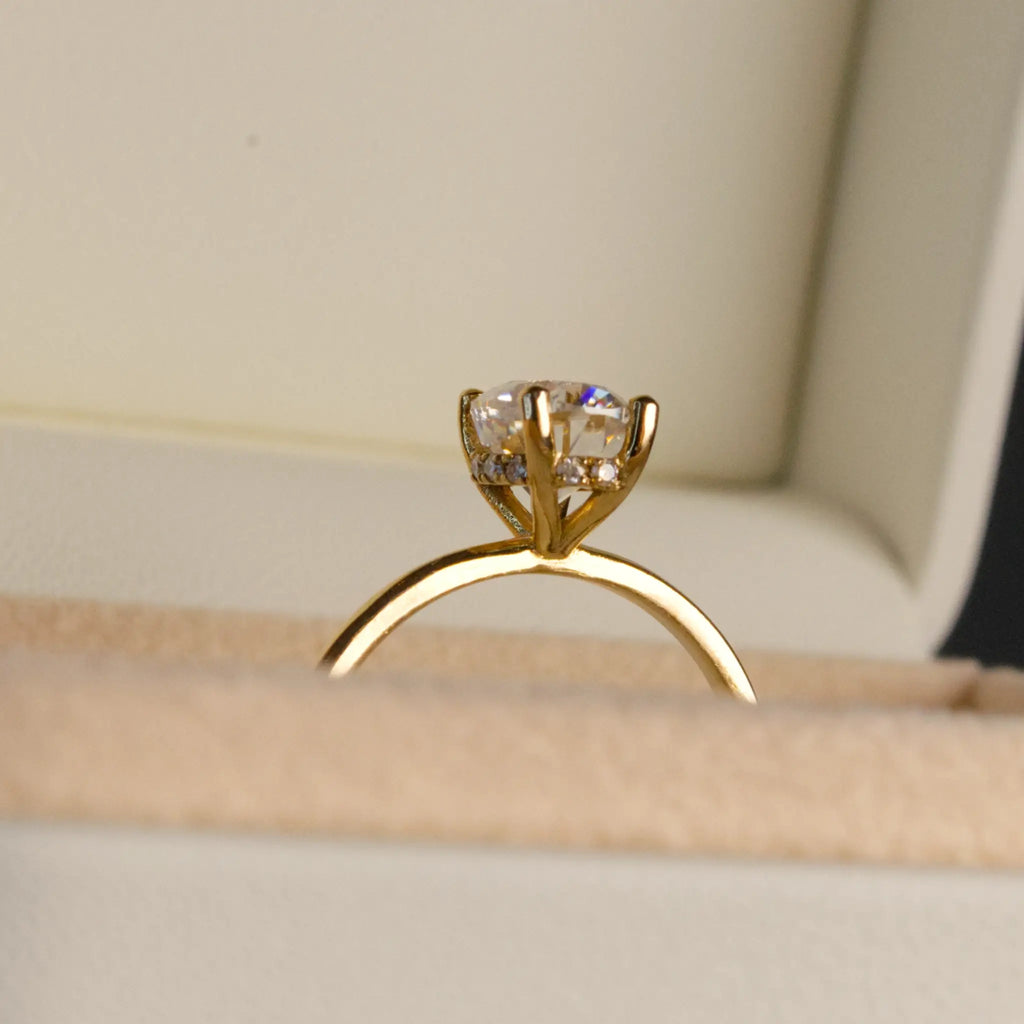 Oval and-Hidden Halo Solitaire Ring