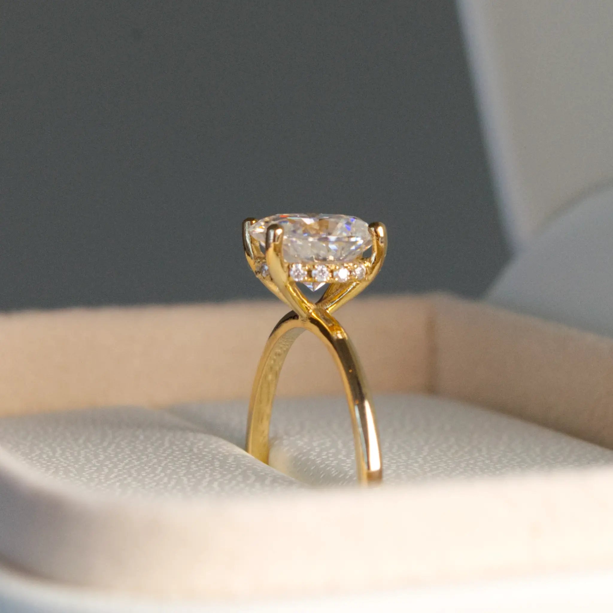 Oval and-Hidden Halo Solitaire Ring