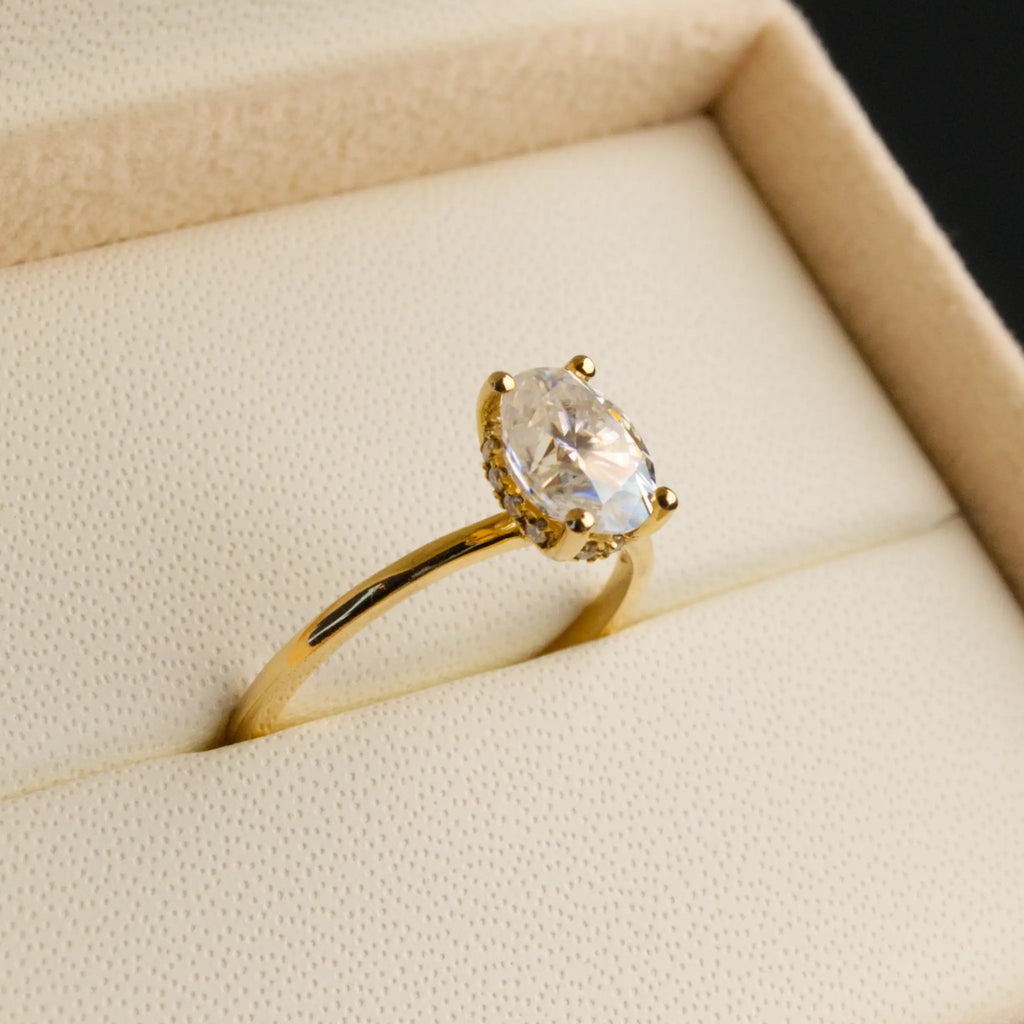 Oval and-Hidden Halo Solitaire Ring