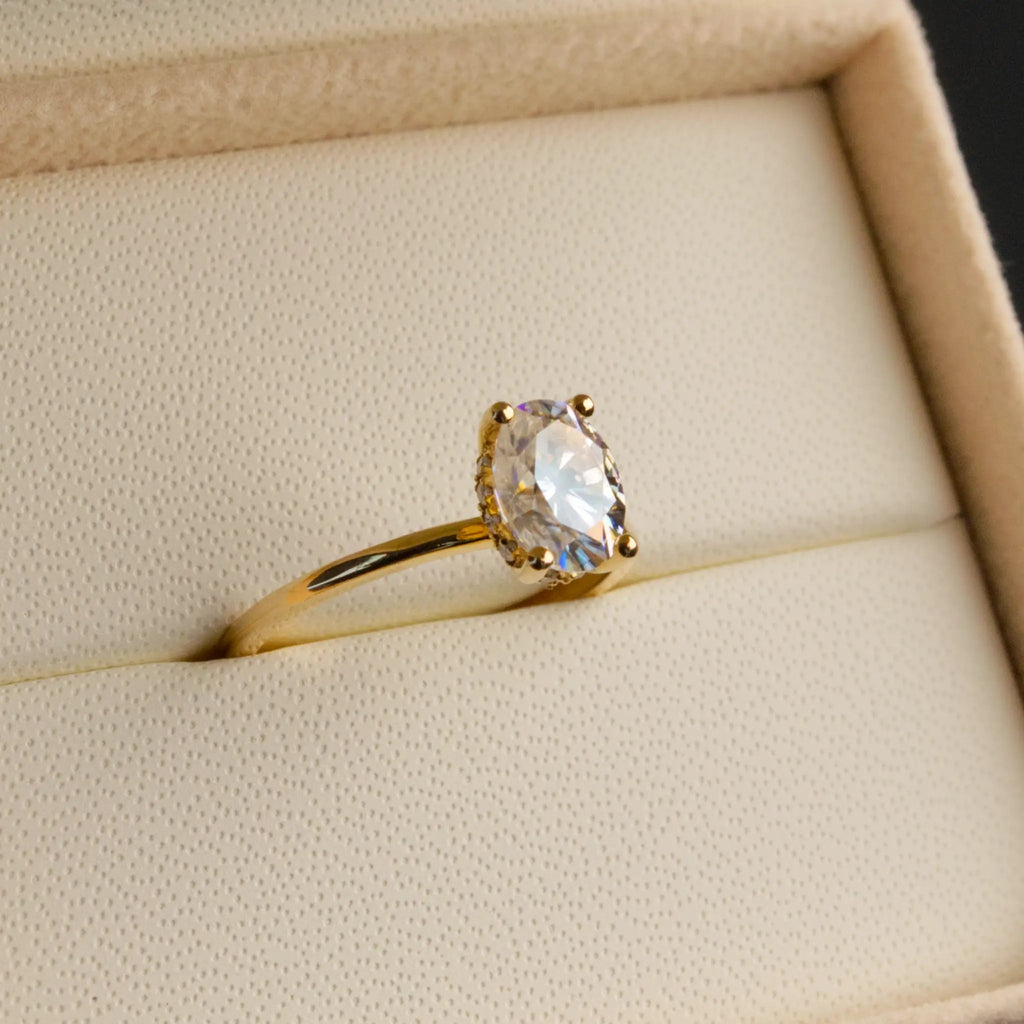 Oval and-Hidden Halo Solitaire Ring