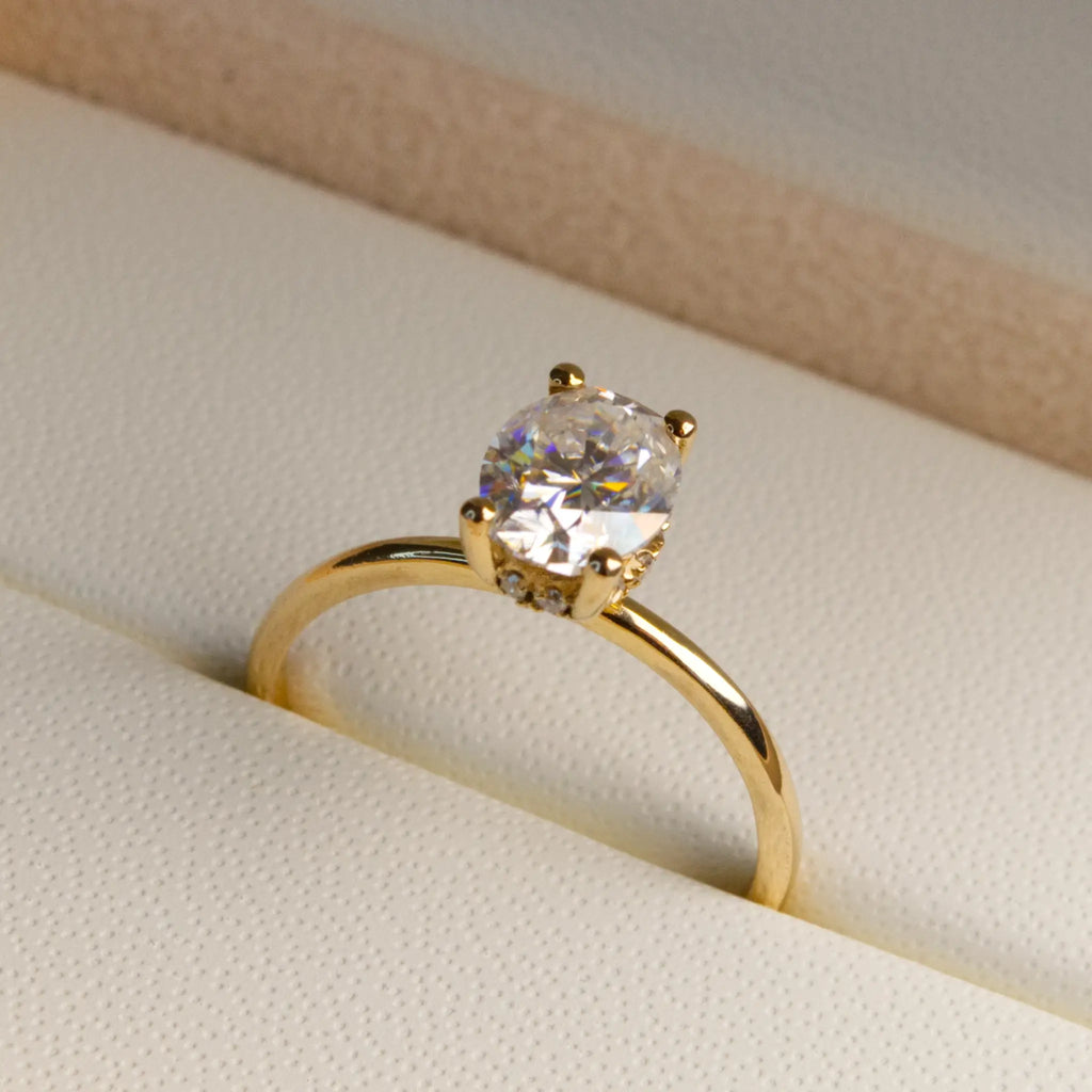 Oval and-Hidden Halo Solitaire Ring