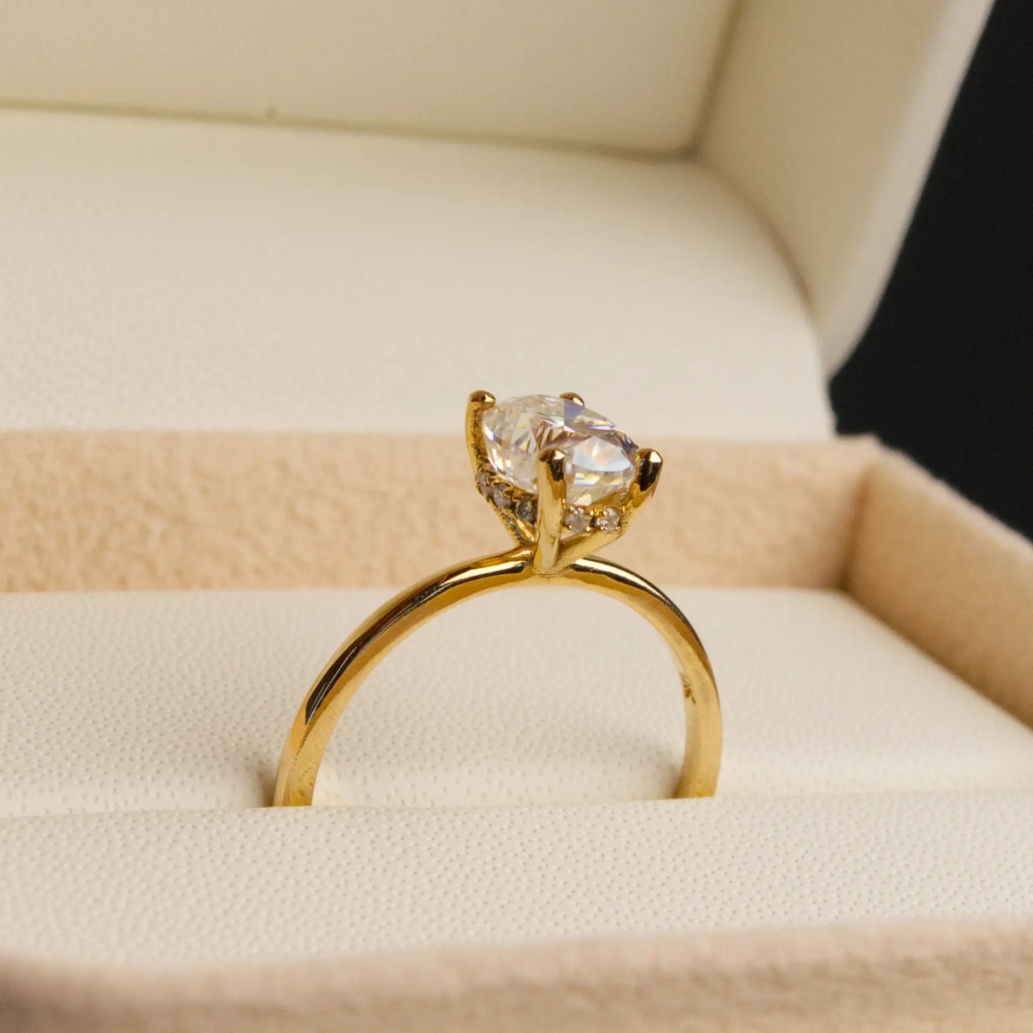 Oval and-Hidden Halo Solitaire Ring