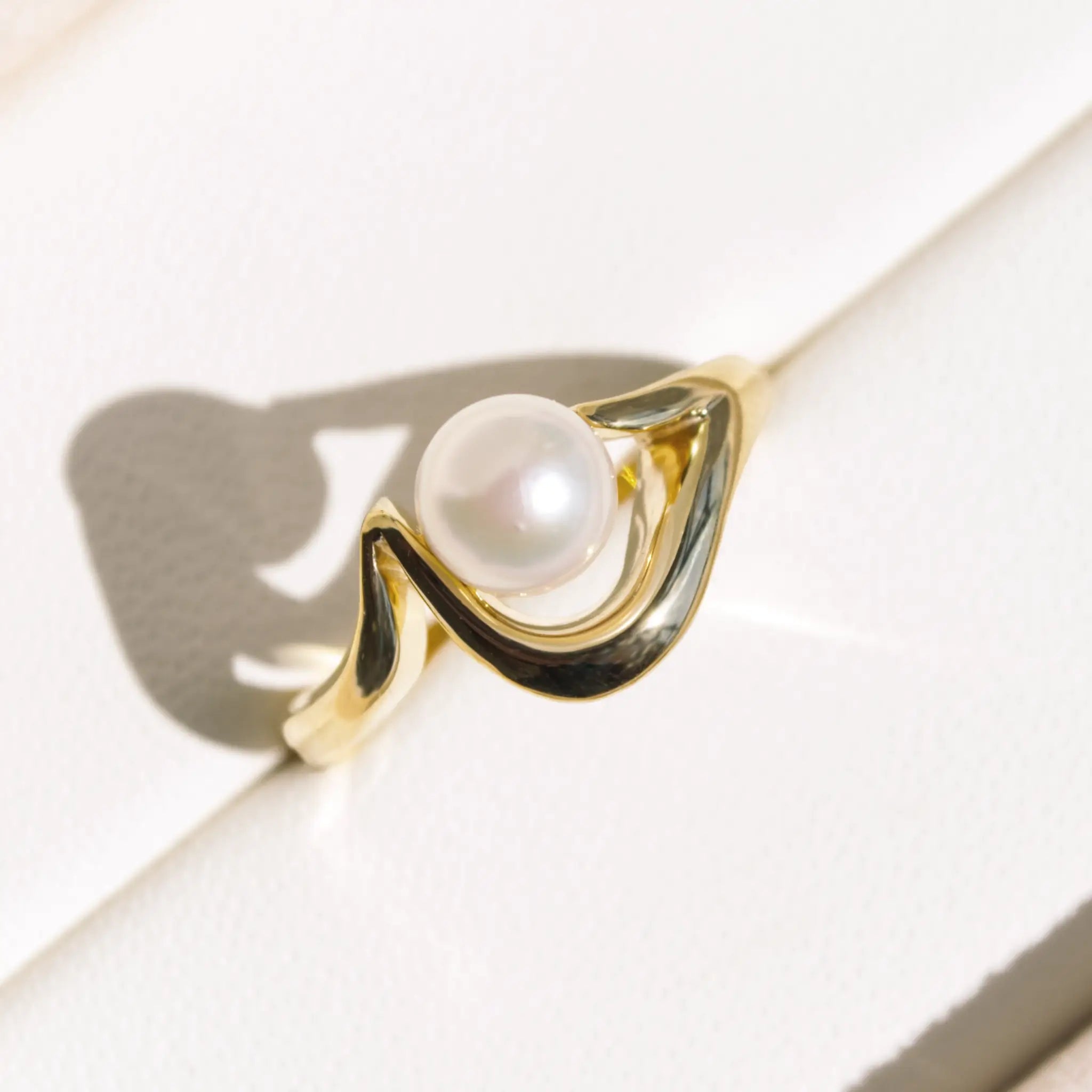 Curved Gold Pearl Ring