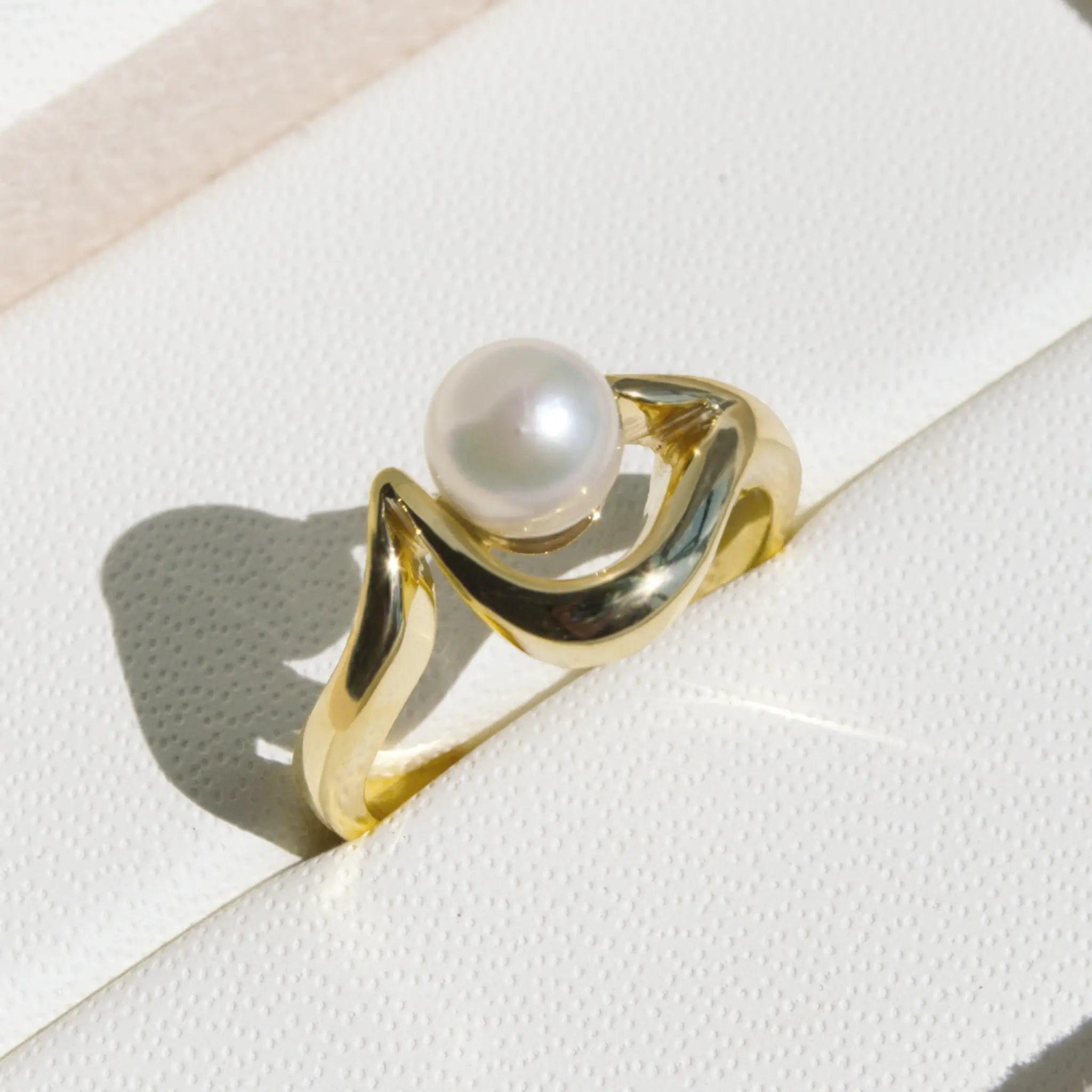 Curved Gold Pearl Ring