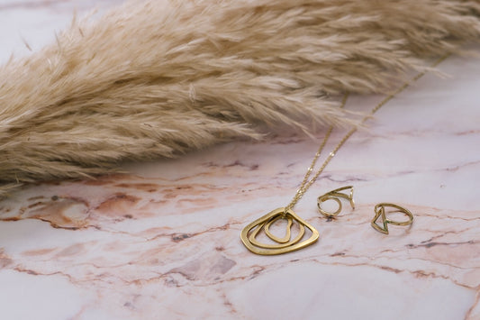 Keeva Curve Brass Necklace